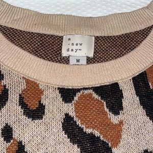 EUC A New Day Cheetah Print Sweater